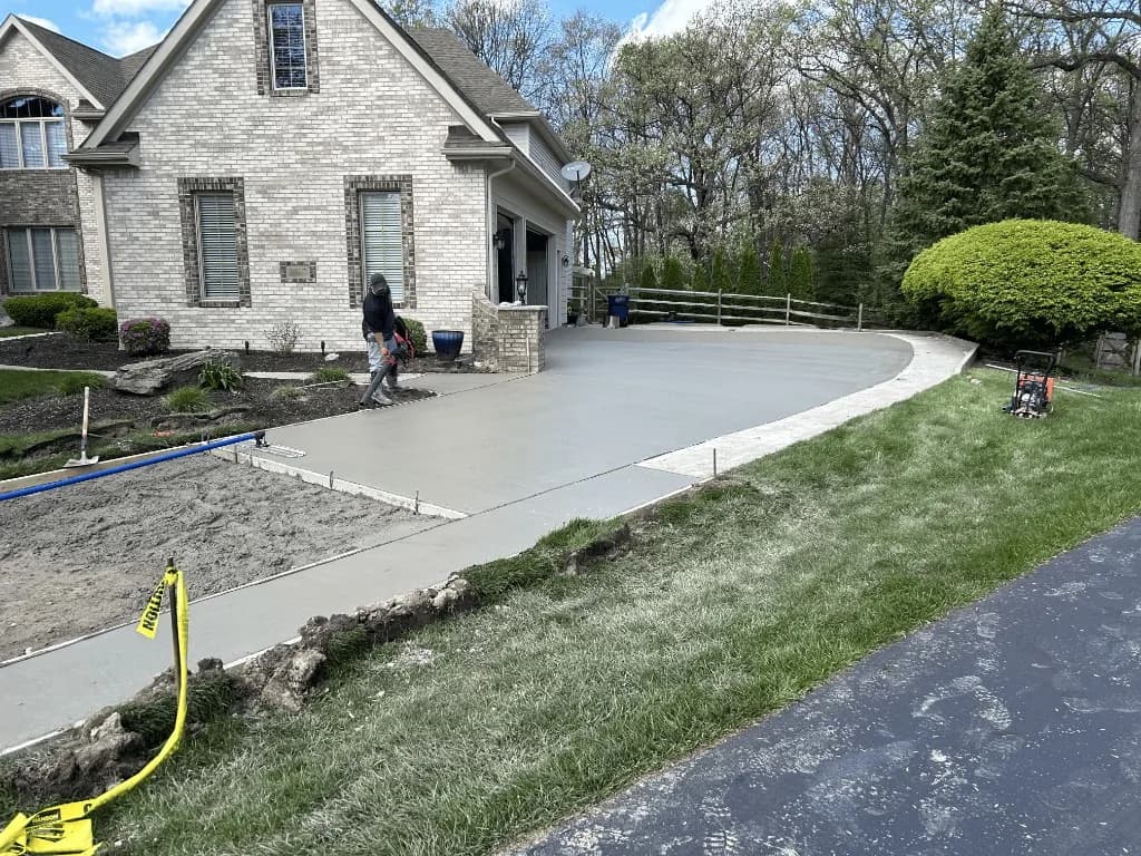 Fresh concrete driveway pour on a residential property